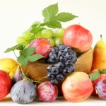 assortment autumn harvest fruit (grapes, figs, apples, plums)